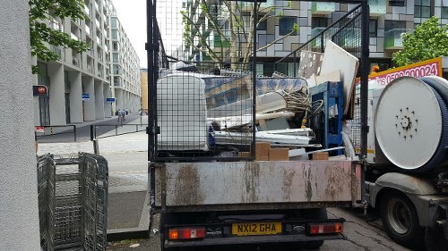 Residents disposing furniture in West London